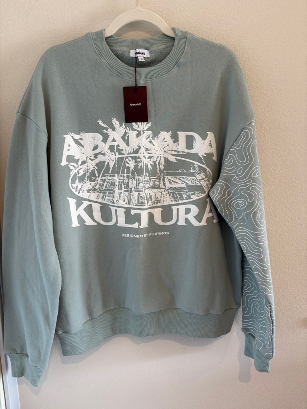 Sage Green color Crewneck Sweater w/ Graphics on front & sleeve & plain back